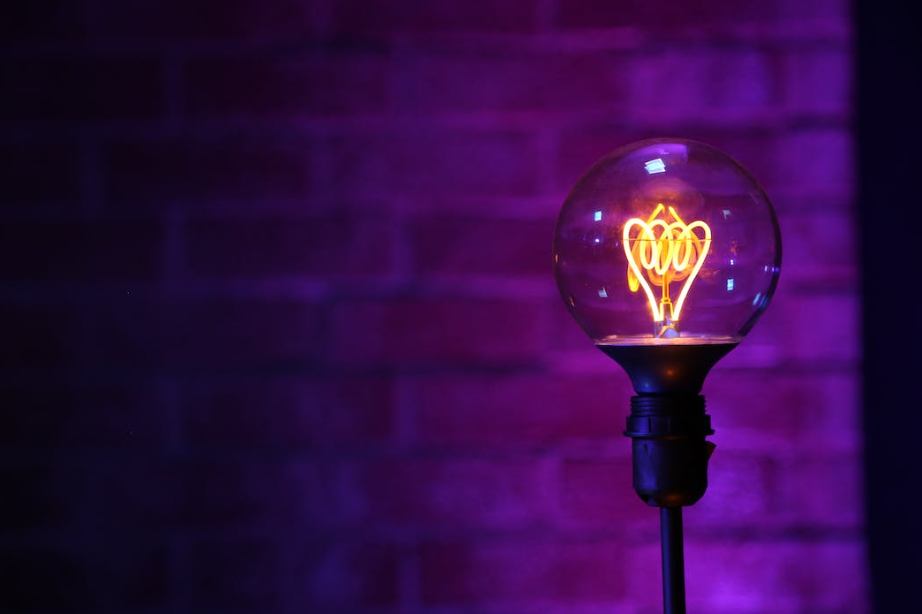 Lightbulb with purple wall