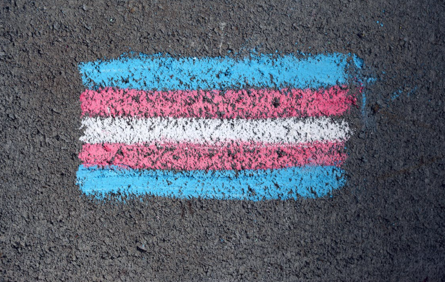 Trans flag in chalk on pavement